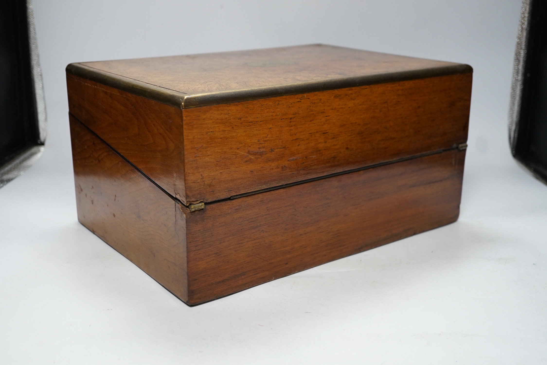 A 19th century brass inlaid burr walnut writing box, 34cm wide